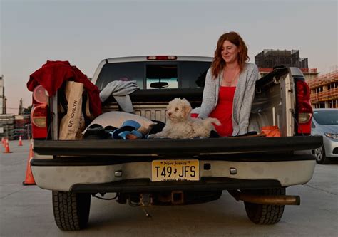 Is it legal to ride in the bed of a truck, and can you do it while eating a sandwich?