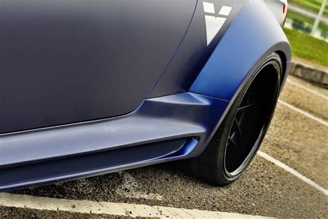 What are side skirts on a car, and why do they sometimes make your vehicle look like it’s wearing a fancy tuxedo?